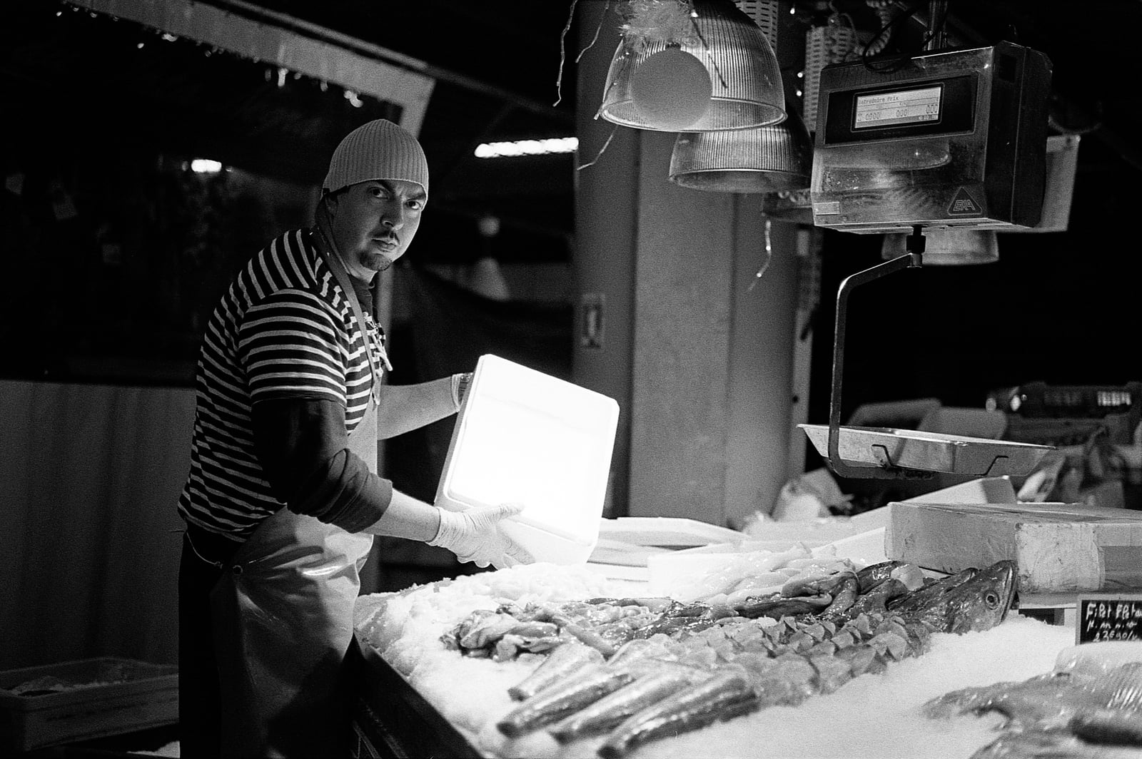 Busy market scene at Marché des Capucins